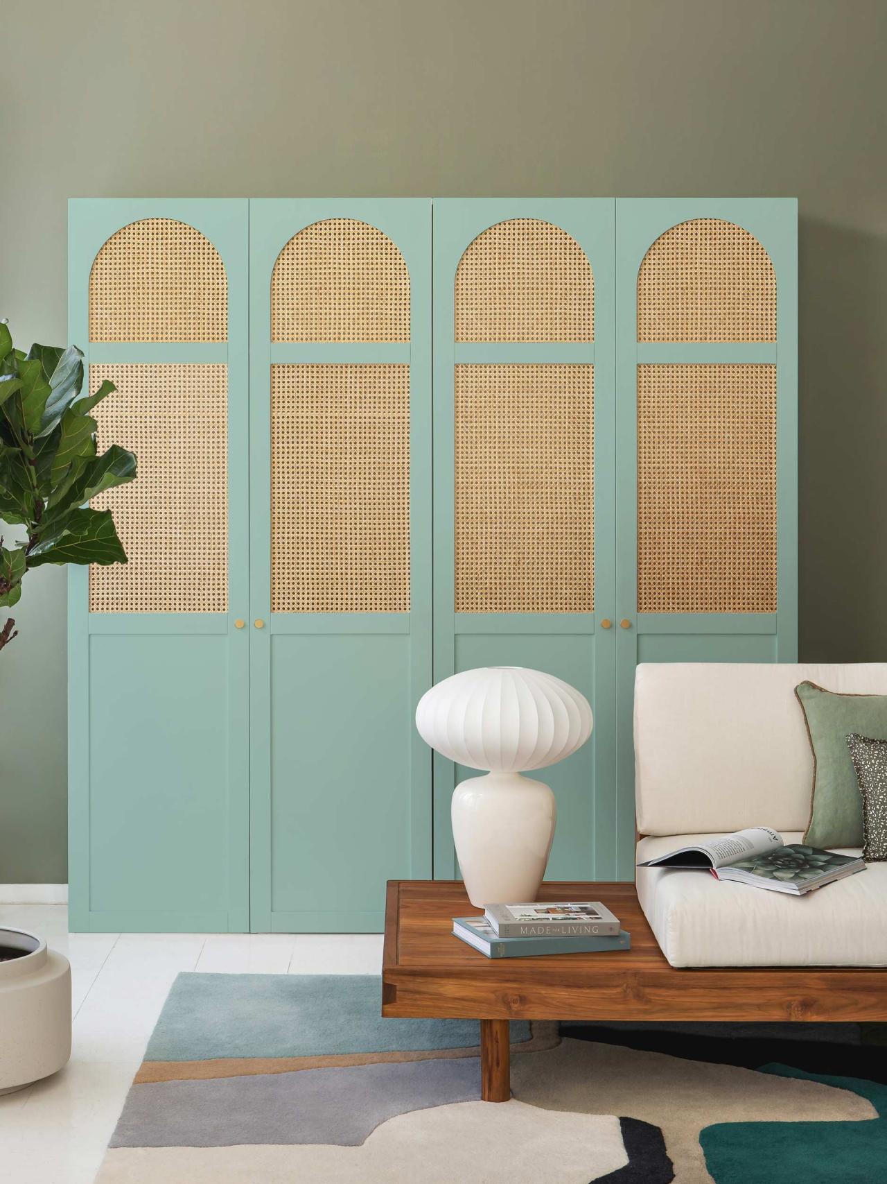 Wardrobe with arched cane doors in the colour Celadon