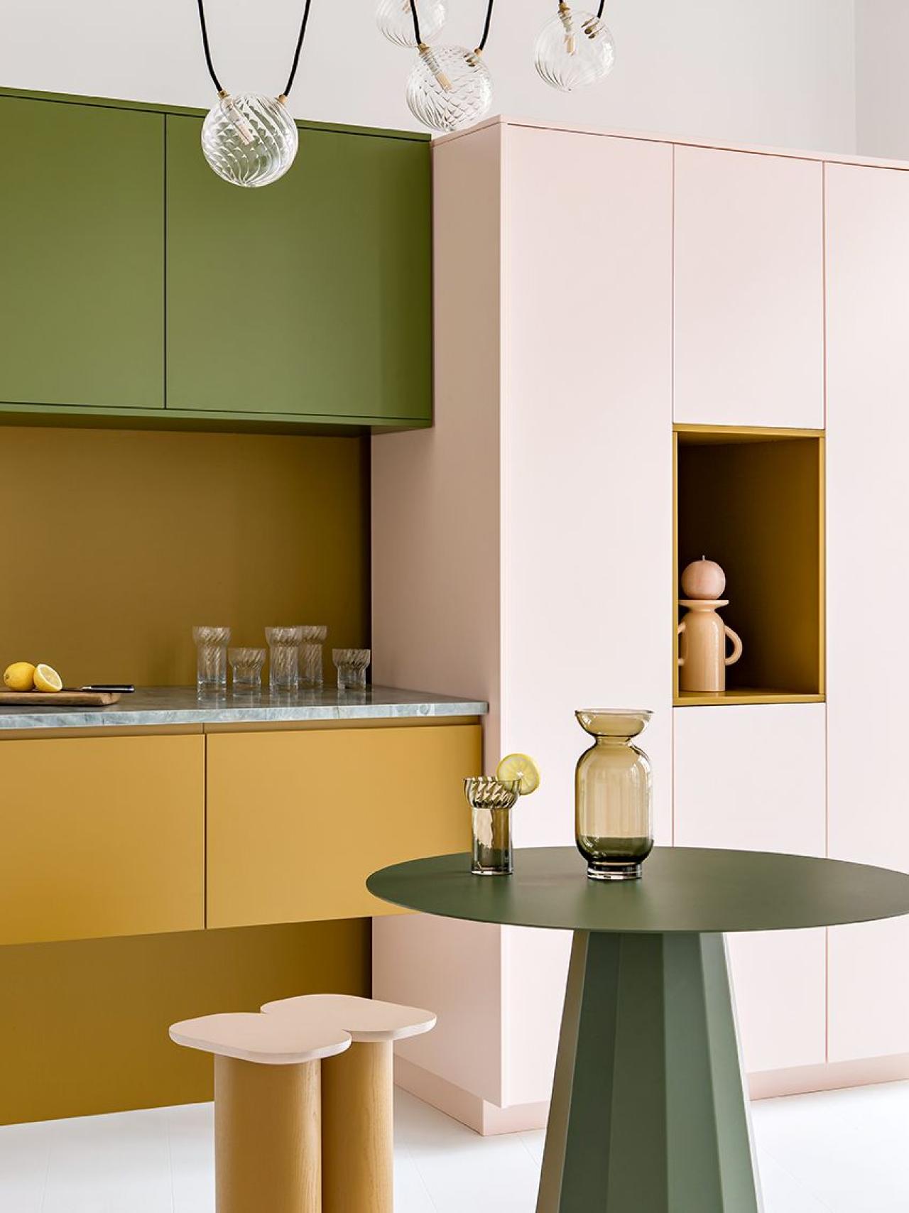 A kitchen in Ocre, Rose calcaire and Romarin by Margaux Keller