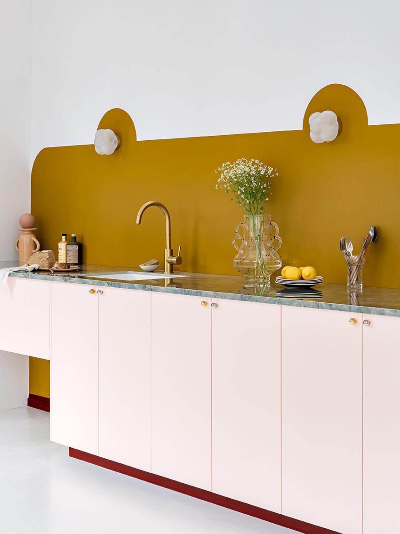A Rose calcaire kitchen created by Margaux Keller. 