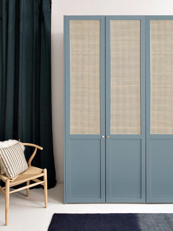 A wardrobe in cane and painted oak