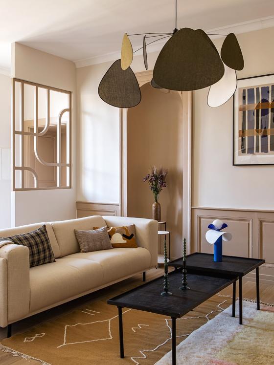 Moka living room with custom claustra and cream sofa