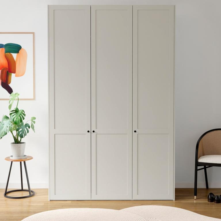 A 3-door wardrobe with a frame