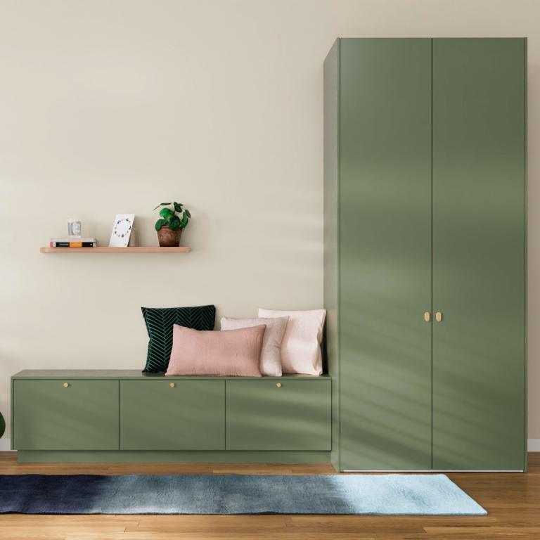 A wardrobe with a bench