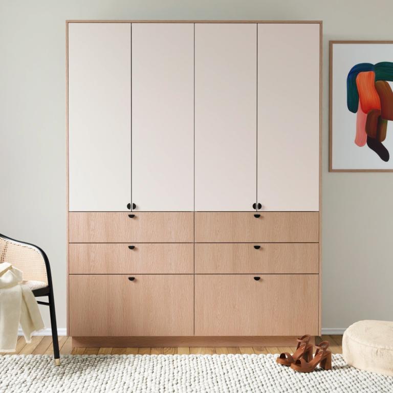 A wardrobe with doors and drawers.