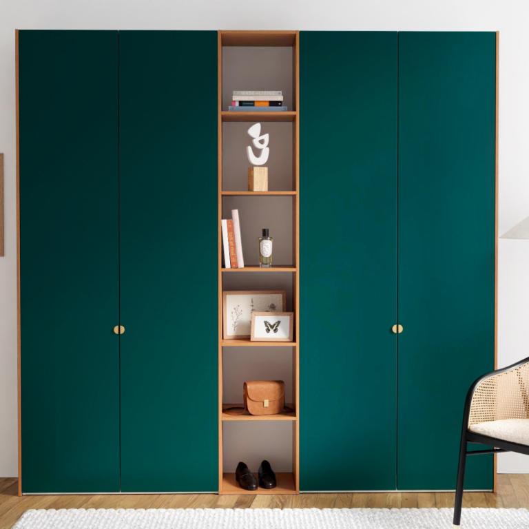 A wardrobe with 4 doors and compartments.